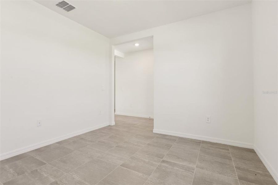 Spacious, unfurnished interior of a new home in Springs at Lake Alfred - Signature Series, Lake Alfred (Image 32).