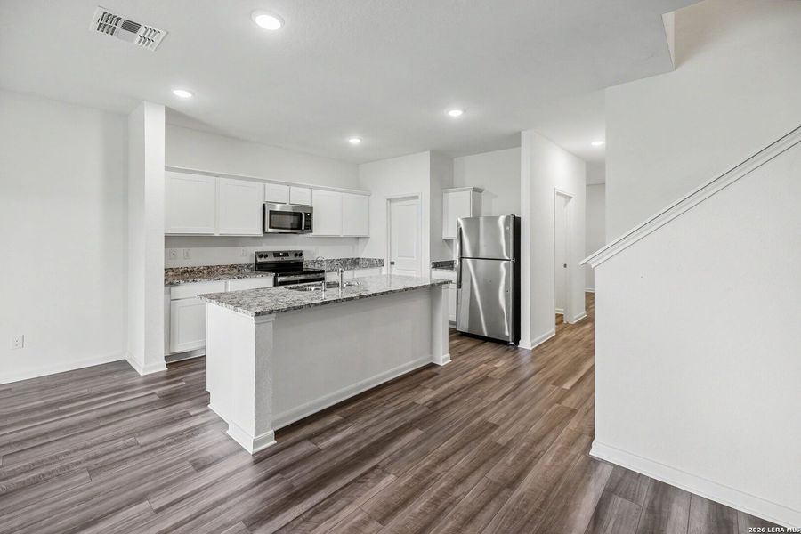 Furnished interior view inside a new home in Hennersby Hollow, San Antonio (Image 10).