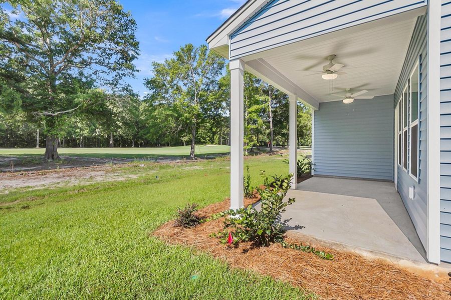 Exterior details and patio area of a home in Fairway Woods at Wyboo, Manning (Image 23).