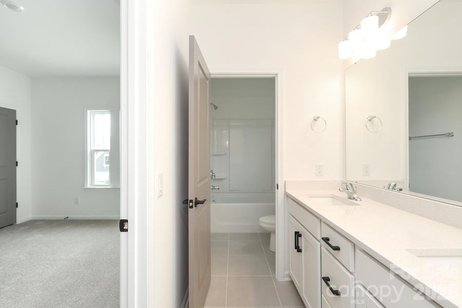 Furnished interior view inside a new home in Estates at Sugar Creek, Indian Land (Image 6).