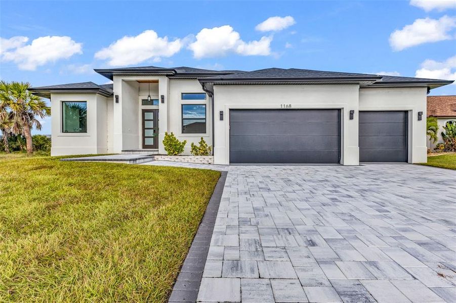 Front exterior of a new home in , Rotonda West, FL, highlighting curb appeal (Image 2). Front exterior of a new home in , Rotonda West, FL, highlighting curb appeal (Image 2).