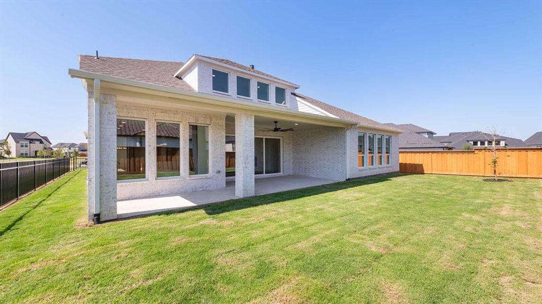 Exterior details and patio area of a home in Fields 60', Frisco (Image 3).