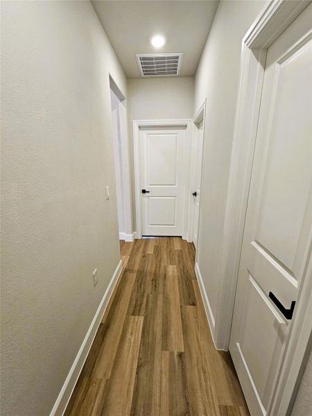 1 Bedroom with baseboards and dark colored carpet