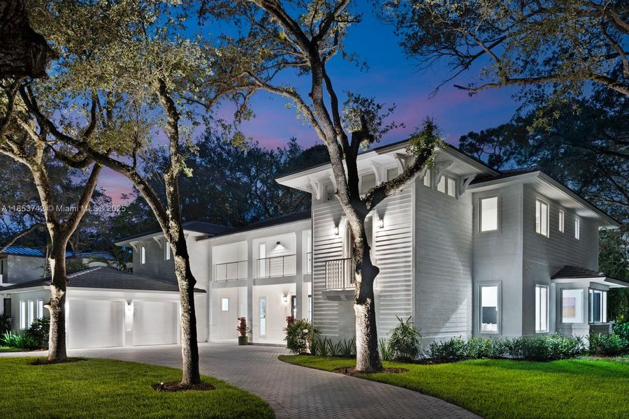 Front exterior of a new home in , South Miami, FL, highlighting curb appeal (Image 21). Front exterior of a new home in , South Miami, FL, highlighting curb appeal (Image 21).