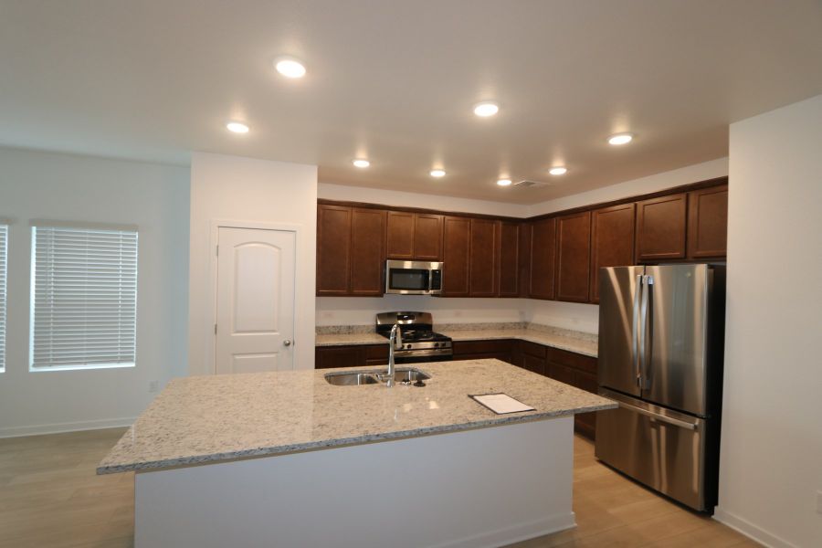 Furnished interior view inside a new home in Kinston Mainstreet Townhomes, Loveland (Image 4).