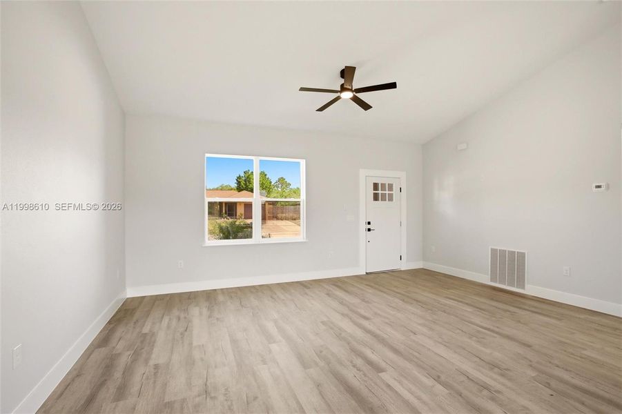 Spacious, unfurnished interior of a new home in , Lake Placid (Image 13).