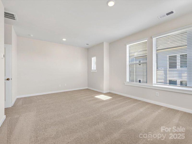 Spacious, unfurnished interior of a new home in Central Living at Craig, Charlotte (Image 20).