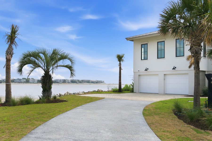 Front exterior of a new home in , Sullivan's Island, SC, highlighting curb appeal (Image 2).