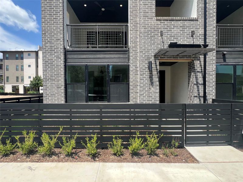 Exterior details and patio area of a home in The Grove, Austin (Image 3). Exterior details and patio area of a home in The Grove, Austin (Image 3).
