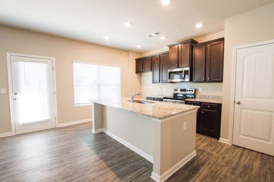 Representative furnished interior of a home built from the Cadence Unit B by Piedmont Residential in Ross Pointe, Kennesaw (Image 7).