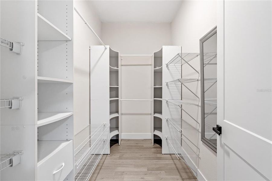 PRIMARY BEDROOM CLOSET PRIMARY BEDROOM CLOSET