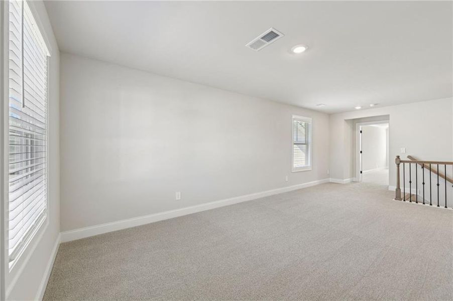 Spacious, unfurnished interior of a new home in Vines at Mill Creek - Estate Series, Braselton (Image 35).