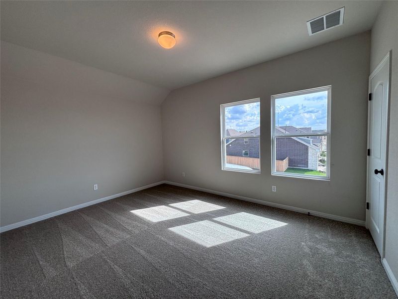 Spacious, unfurnished interior of a new home in The Colony 50s, Bastrop (Image 18).