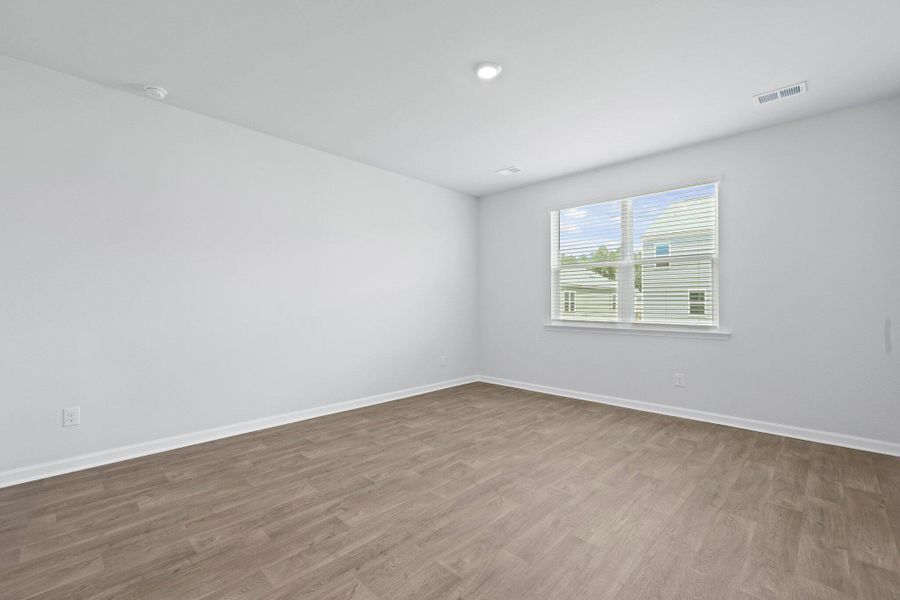 Spacious, unfurnished interior of a new home in Pine Hills at Cane Bay, Summerville (Image 15).