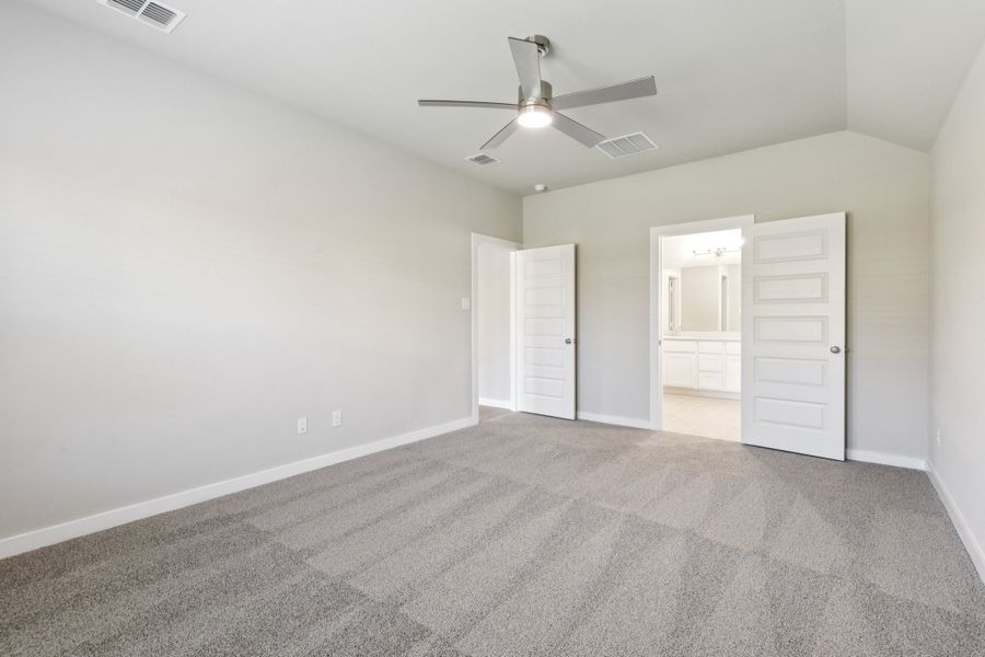 Primary Suite in the Emmy II home plan by Trophy Signature Homes - REPRESENTATIVE PHOTO Primary Suite in the Emmy II home plan by Trophy Signature Homes - REPRESENTATIVE PHOTO