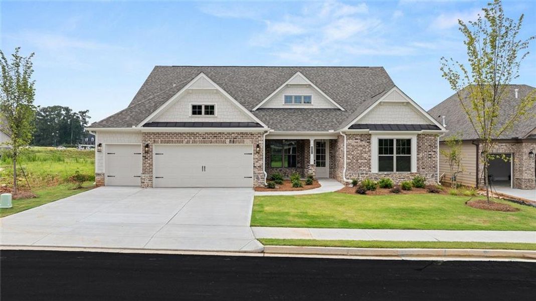 Front exterior of a new home in Soleil Summit Chase, Snellville, GA, highlighting curb appeal (Image 25).