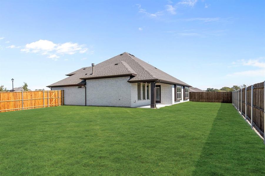Exterior details and patio area of a home in East Oak Creek 50-55, Commerce (Image 22). Exterior details and patio area of a home in East Oak Creek 50-55, Commerce (Image 22).
