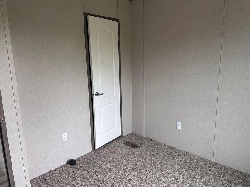 View of carpeted spare room View of carpeted spare room