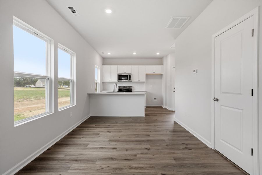 Spacious, unfurnished interior of a new home in Cambridge Reserve, Angier (Image 21).