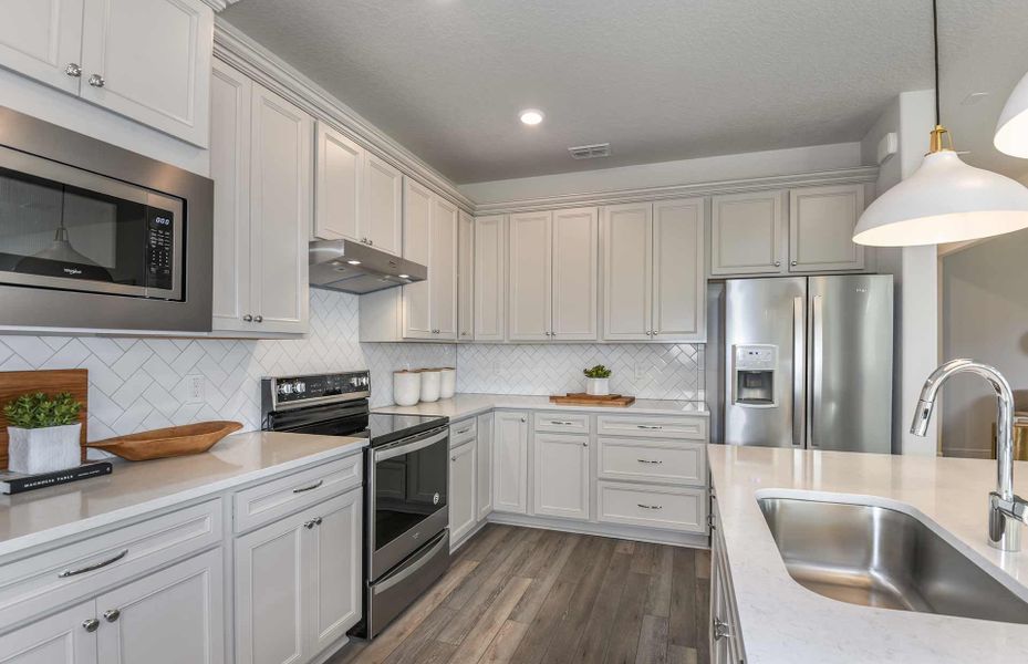 Open Kitchen with Island and Generous Countertop Space