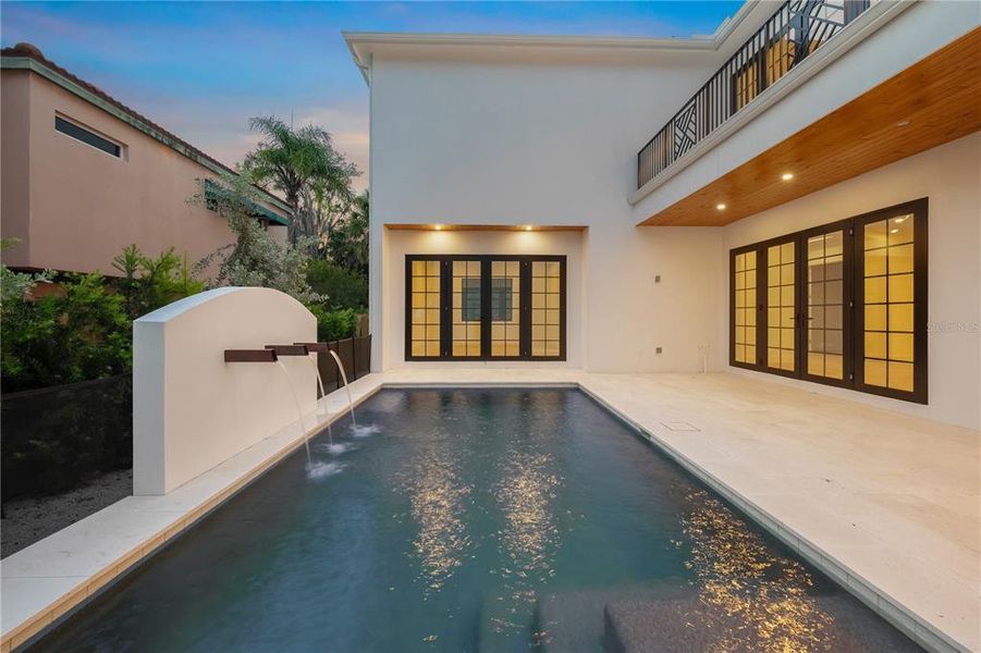 Exterior details and patio area of a home in , Sarasota (Image 21).