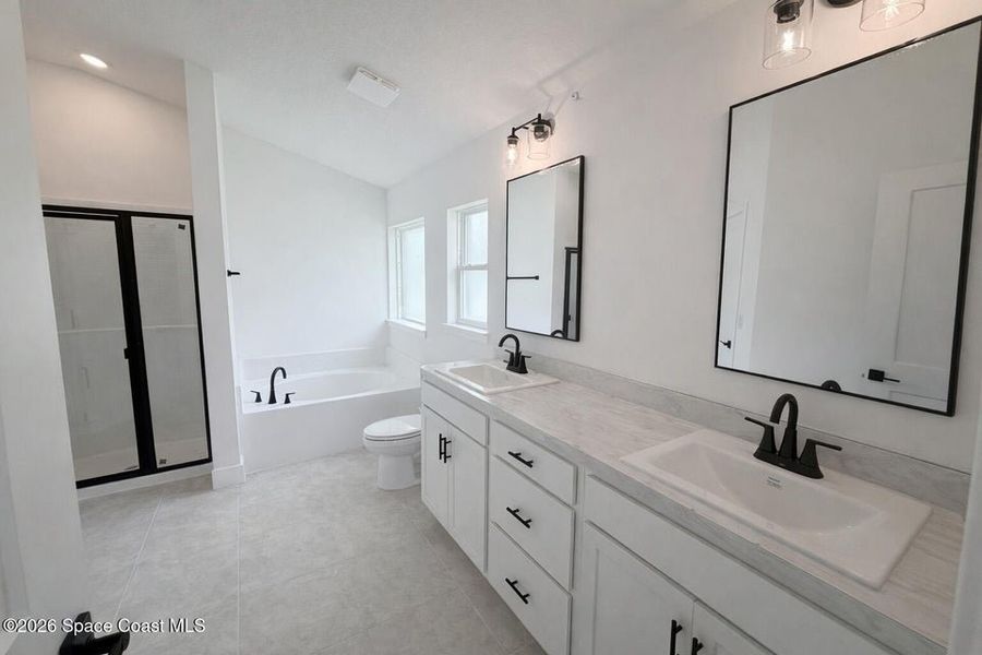 Furnished interior view inside a new home in St. John's Preserve, Palm Bay (Image 11).