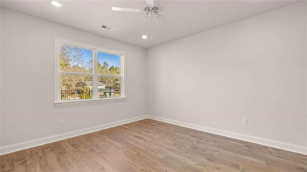 Spacious, unfurnished interior of a new home in Oak Ridge Meadows - Active Adult, Locust Grove (Image 18).