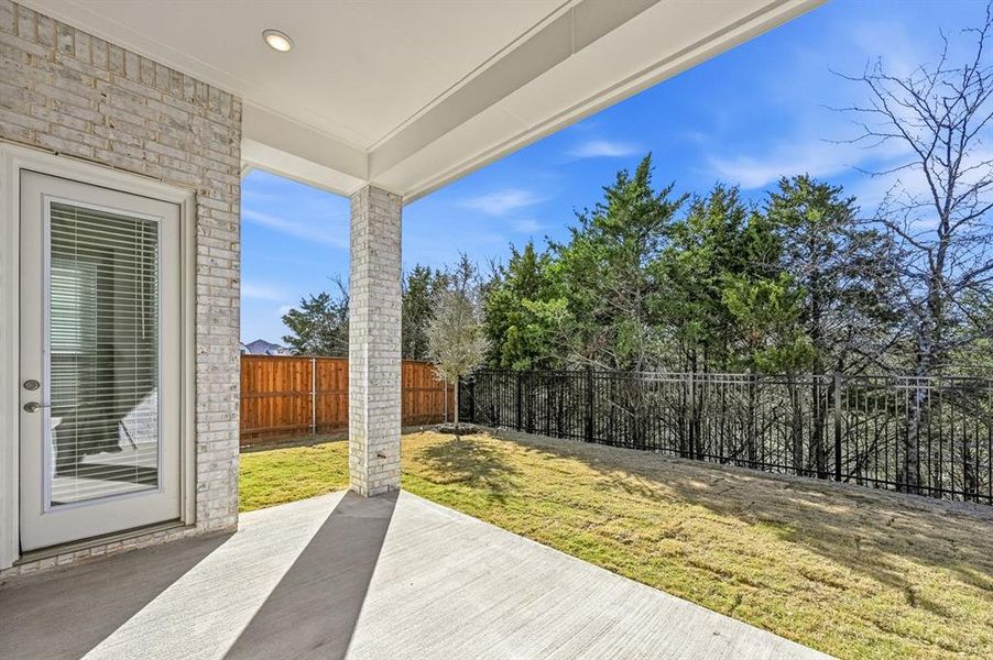 Exterior details and patio area of a home in Aster Park, McKinney (Image 18).