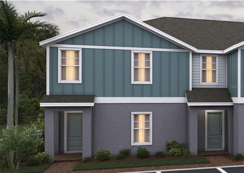 Front exterior of a new home in Pine Meadows Reserve, Eustis, FL, highlighting curb appeal (Image 1).