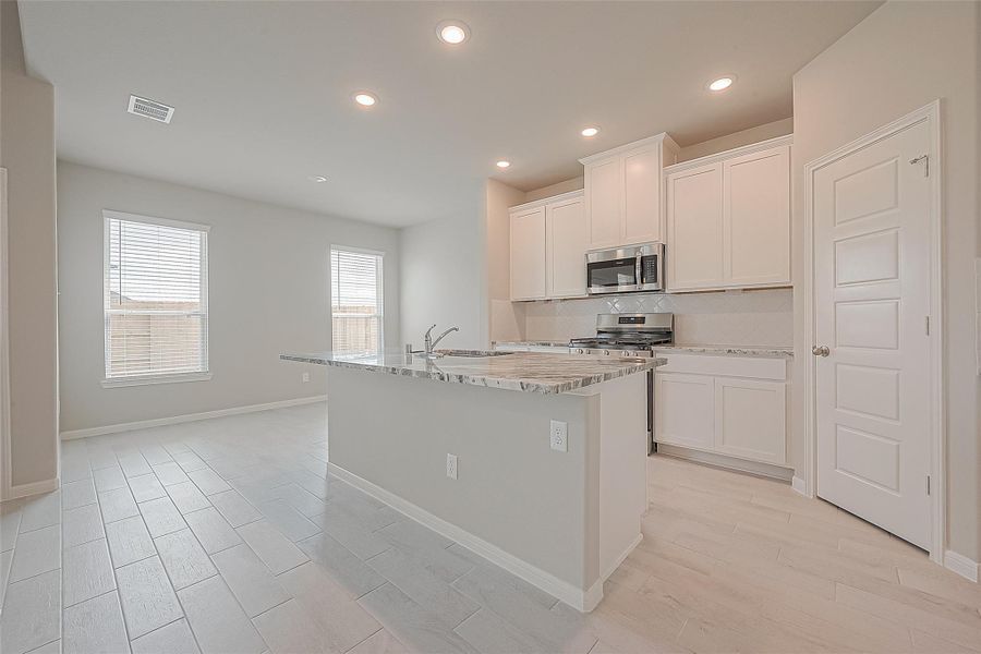 Furnished interior view inside a new home in Rates starting as low as, Iowa Colony (Image 14).