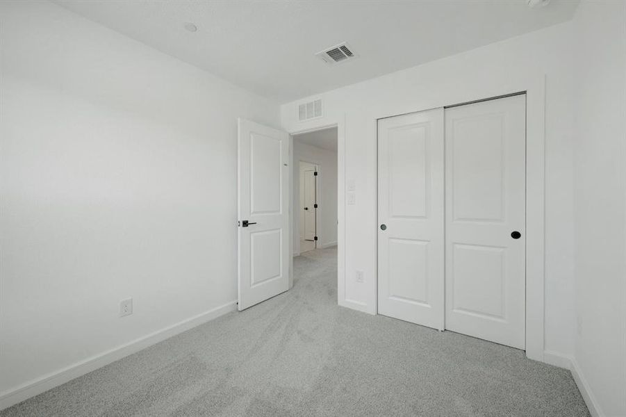 Spacious, unfurnished interior of a new home in Providence Commons, Providence Village (Image 13).