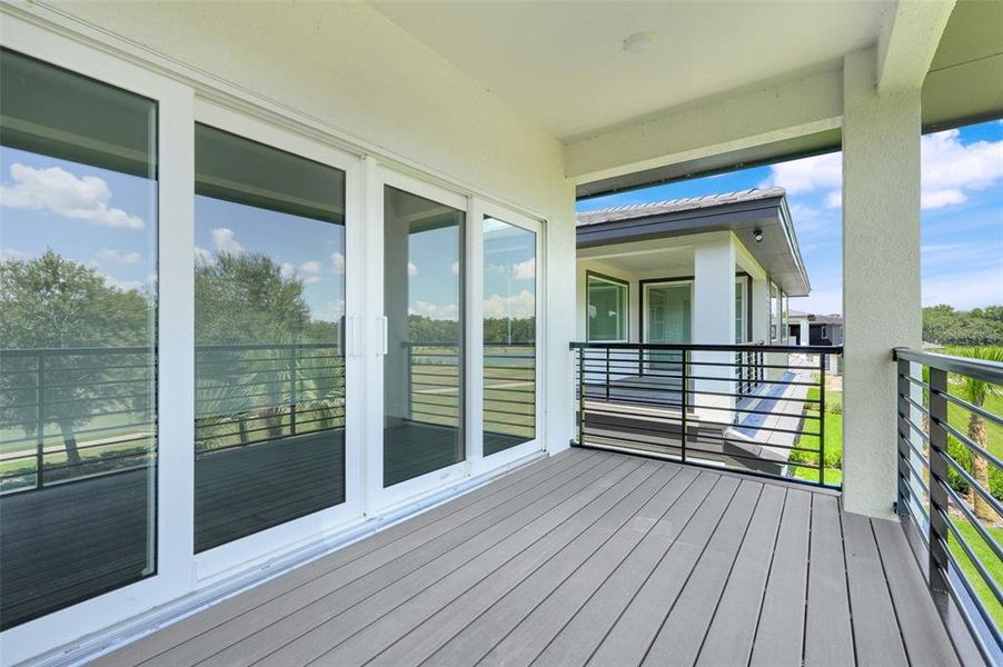 Exterior details and patio area of a home in Hampton Green at Providence, Davenport (Image 3).