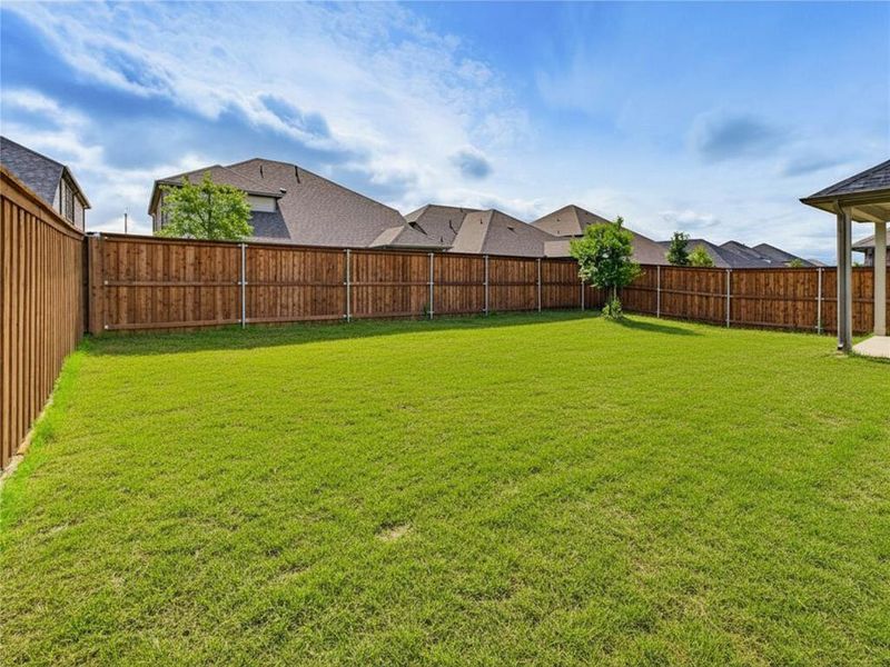Exterior details and patio area of a home in Madero, Haslet (Image 25).