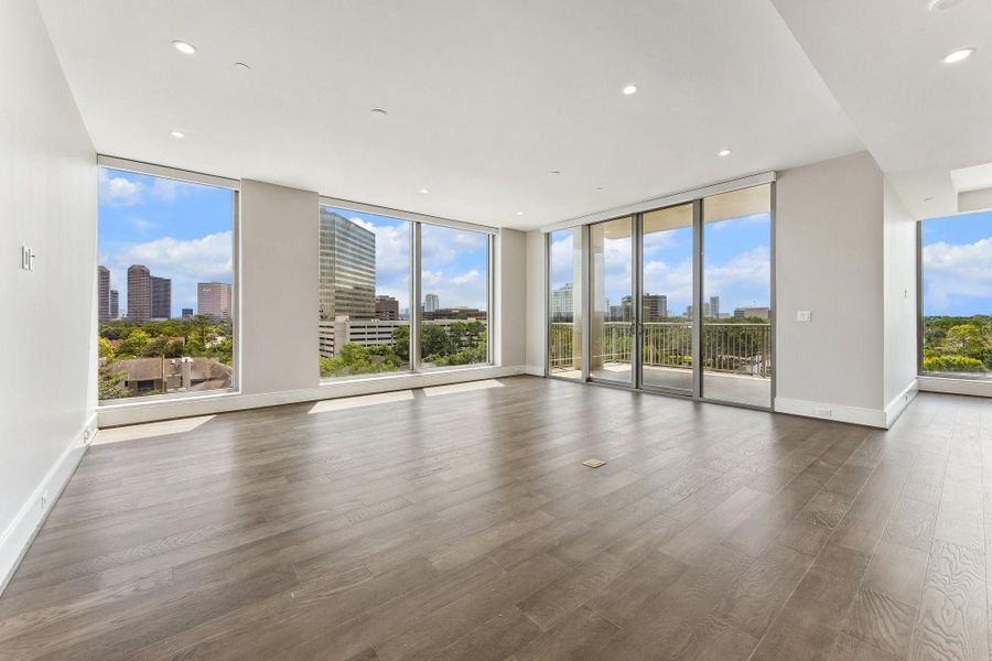 Photo of actual living room to convey the spacious layout and the open concept of the living area