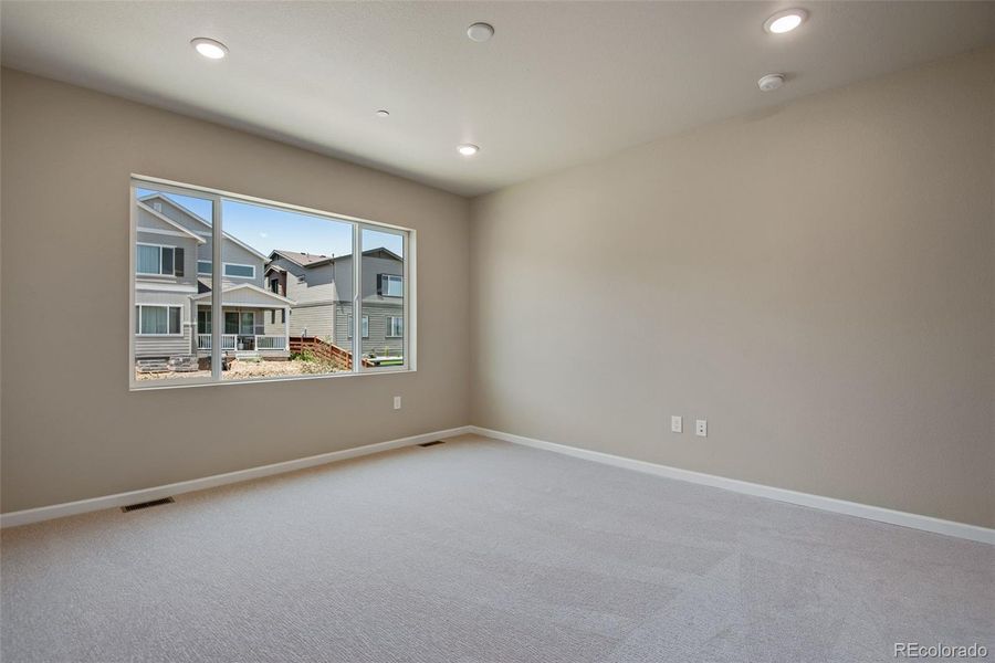 Spacious, unfurnished interior of a new home in Reunion Ridge, Commerce City (Image 47).