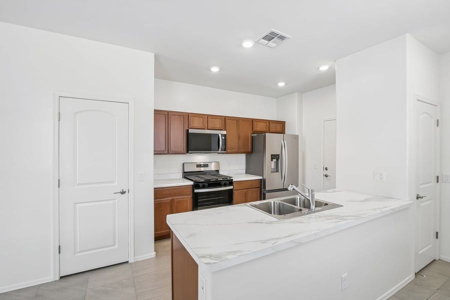 Furnished interior view inside a new home in Saguaro Haven, Tucson (Image 6). Furnished interior view inside a new home in Saguaro Haven, Tucson (Image 6).