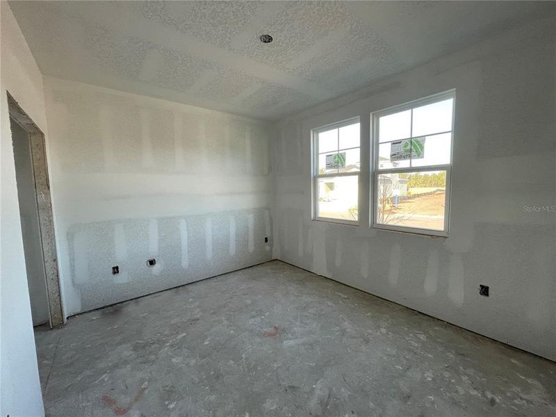 Spacious, unfurnished interior of a new home in Magnolia Series at Seminole Palms, Palm Coast (Image 21).