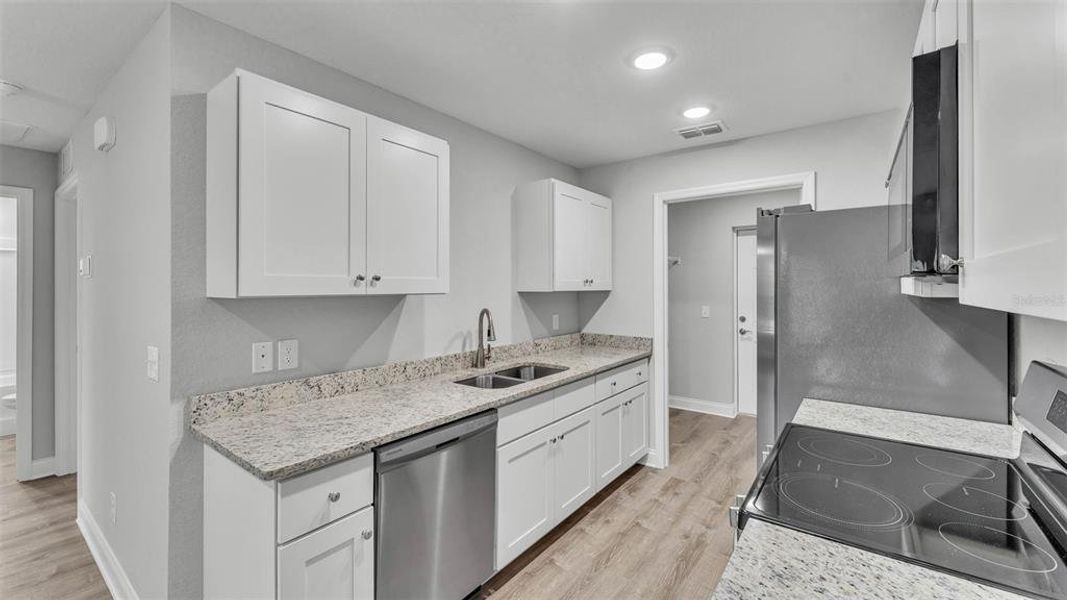 Furnished interior view inside a new home in , Fort Meade (Image 8).