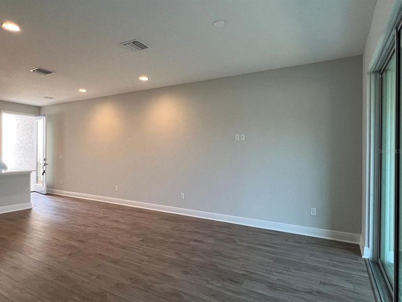 Spacious, unfurnished interior of a new home in The Towns At Long Bayou, Seminole (Image 23).