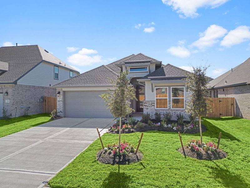 Front exterior of a new home in , Spring, TX, highlighting curb appeal (Image 14). Front exterior of a new home in , Spring, TX, highlighting curb appeal (Image 14).