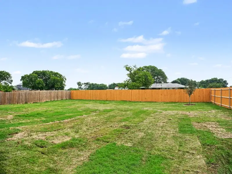 Exterior details and patio area of a home in Cole Crossing Estates, DeSoto (Image 4).