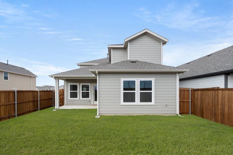 Exterior details and patio area of a home in The Meadows, Denton (Image 30).