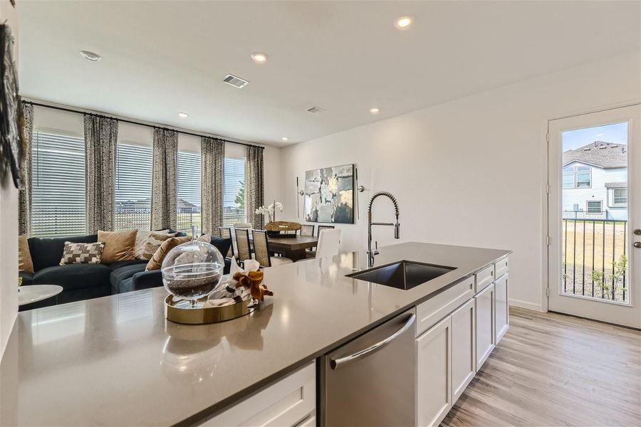 Furnished interior view inside a new home in Bridgeland, Cypress (Image 6).