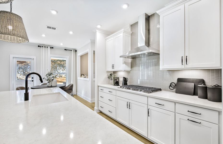 Representative furnished interior of a home built from the Woodward by Pulte Homes in Riversprings, Dacula (Image 18).
