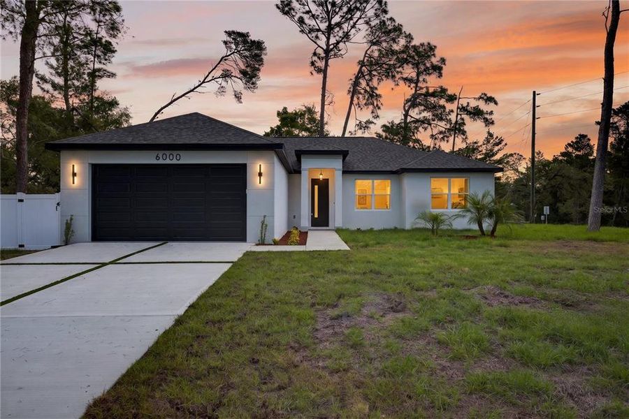 Front exterior of a new home in , Spring Hill, FL, highlighting curb appeal (Image 31).