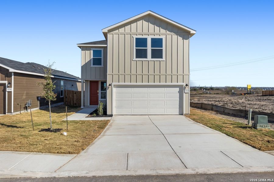 Front exterior of a new home in Punta Verde, Converse, TX, highlighting curb appeal (Image 19).