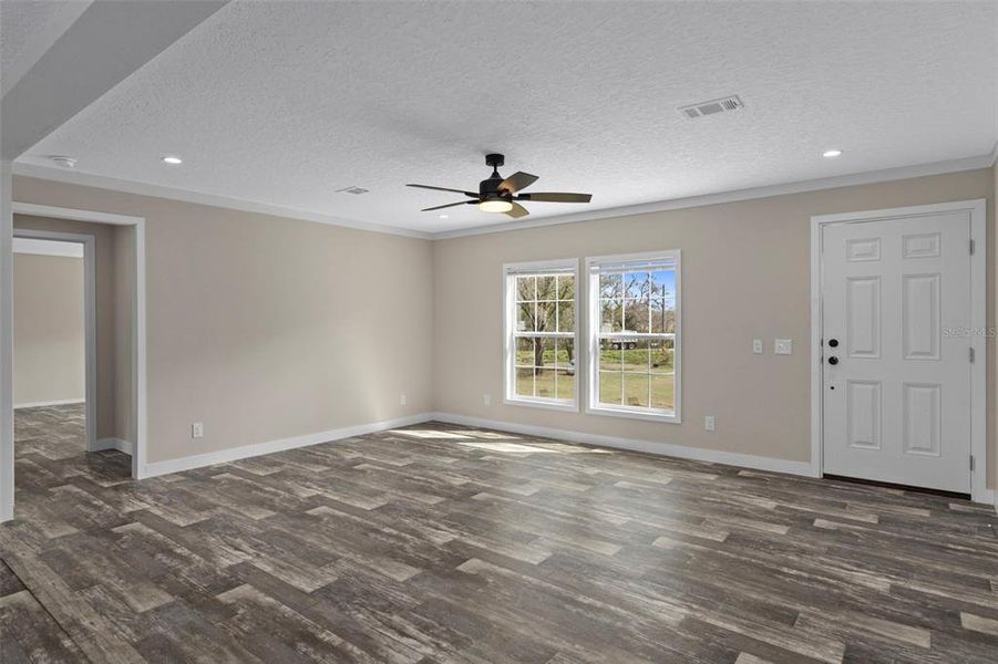 Spacious, unfurnished interior of a new home in , Dade City (Image 42).
