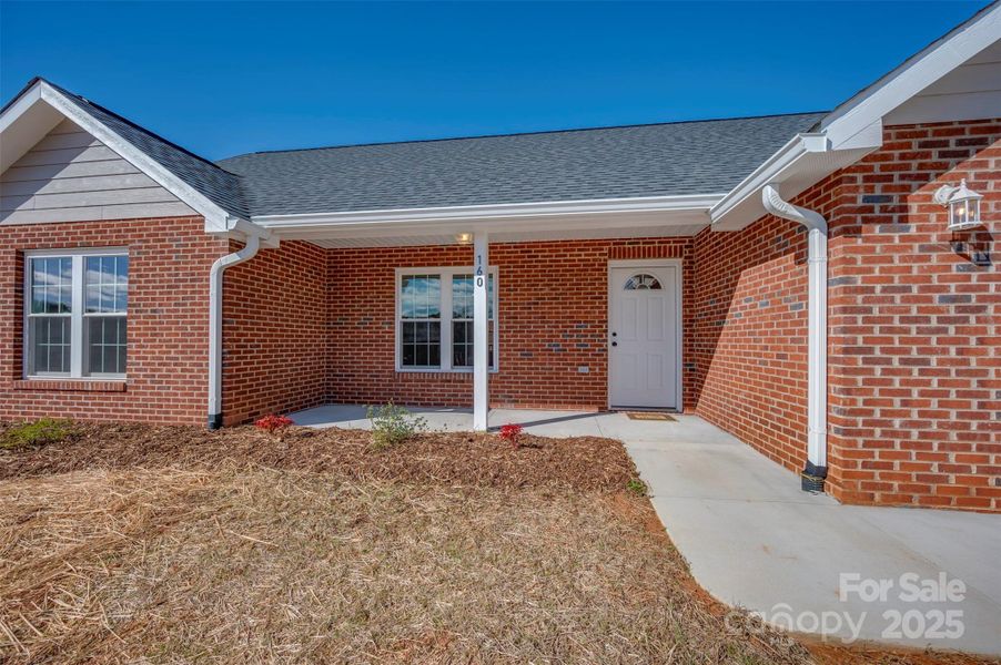 Front exterior of a new home in , Spindale, NC, highlighting curb appeal (Image 16).