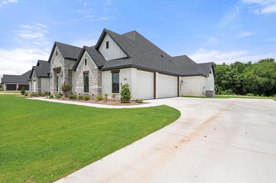 Front exterior of a new home in , Midlothian, TX, highlighting curb appeal (Image 24).
