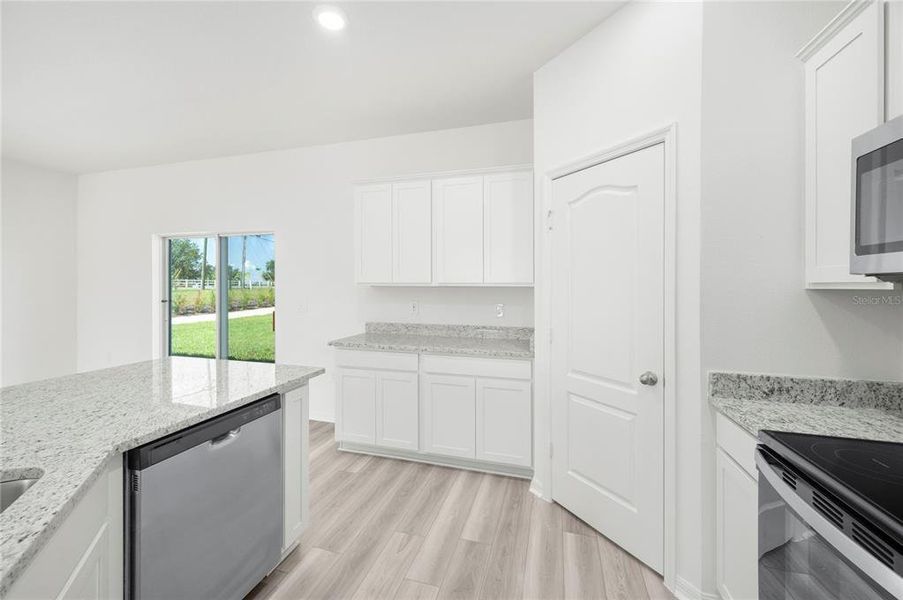 Furnished interior view inside a new home in Citrus Place, Babson Park (Image 9). Furnished interior view inside a new home in Citrus Place, Babson Park (Image 9).